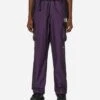 UNDERCOVER Soukuu Hike Belted Utiltiy Shell Pants Purple Pennant 2 UNDERCOVER Soukuu Hike Belted Utiltiy Shell Pants Purple Pennant -Capo Perfetto Negozio TheNorthFaceProjectX Clothing TrackPants TnfXProjectUBeltedConvertiblePantPurple NF0A87UDWO71 20240327170057 C 01